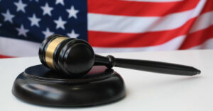 Gavel in front of American flag – Alabama bankruptcy law concept